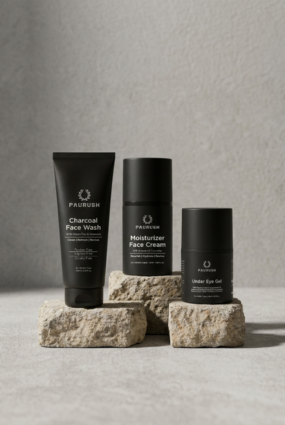 PAURUSH Complete Routine for men: Charcoal Face Wash, Moisturizer Face Cream and Under Eye Gel on stone blocks